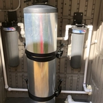 right is a sediment filter with water softener and on right a disruptor filter that handles all the water contaminants including metals