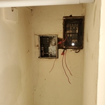 old federal pacific breaker box with no cover inside a closet. most definitely needs to be replaced and made safe