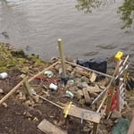 During. Setting posts during flood. Waters raised within two days they was no beach left. This project was on the missippi river just outside red wing, MN