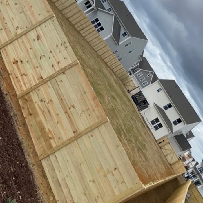 Aerial view of rear fence line; fence on R side was NOT installed by Caliber Fencing.