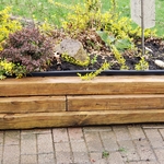 Customer was satisfied with how well there wood surrounding there yard looked once the job was done.