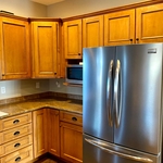 before corner cabinet/countertop area