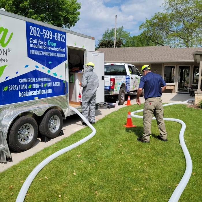 Our crew preparing to install insulation in our customer's attic.
