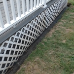 The lattice is then reinstalled over the hardware cloth