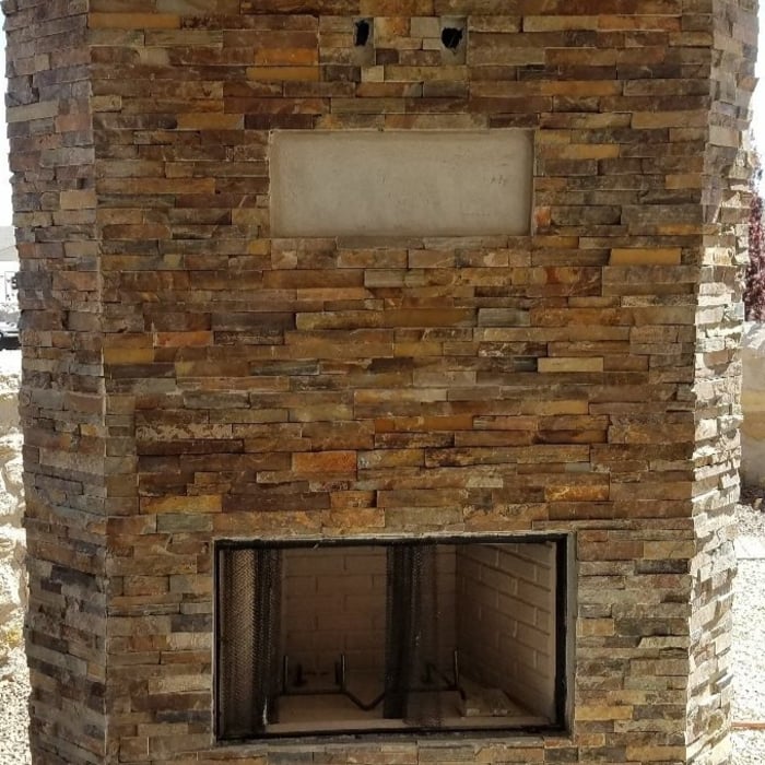 Customer added fire place on exterior porch