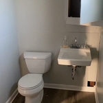 Put in a new toilet ,sink ,painted bathroom ,and patched hole in wall