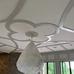 Sprayed trim and painted inside areas of the wall