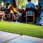 Check the detail out on the concrete pavers paired up with the synthetic grass. Clean and modern.
