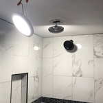 from ugly brown tiles to new white ones and added lights in shower