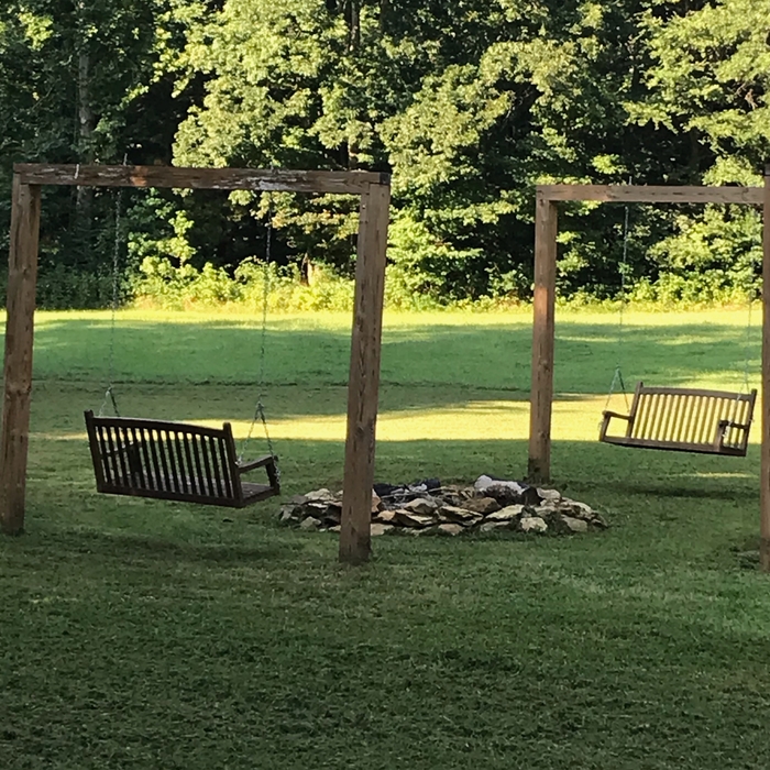 Rock fire pit and 6x6 frames to accommodate different size swings