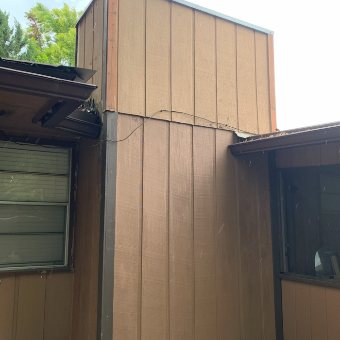 This is the problem that made our client call us. The gutter and roof fell a couple inches due to the roof rafters rotting along with the fascia and ceiling joist. We replaced all the compromised wood, jacked up the roof to the proper pitch and re-framed the joists, rafters, and fascia into the chimney framing to reinforce the entire roof.