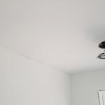 Ceiling after skimming texture and prime.