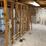 We completely demo'd out the basement down to the concrete and then redesigned a new floor plan with the customer that fit their lifestyle requirements