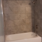 New Whirlpool tub with tiled walls