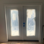 Shows both doors before handles sets were installed