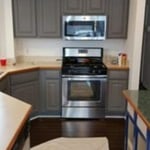 Cabinets after we got done painting them from wood to this.