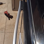 Before repair. Notice gap in door