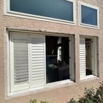 Removing the existing windows to weather proofing them.