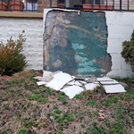 A view of the extensive damage on the upper left hand corner of the side walls, as well as the amount of material that had to be removed to repair the area.