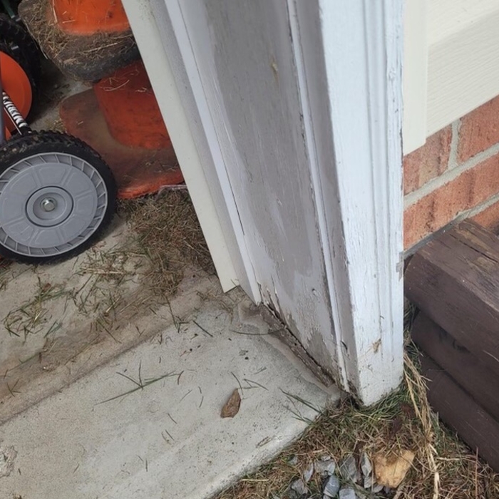 Trim rot on the bottom portion of 2 garage bays