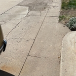 Front of driveway broken before picture