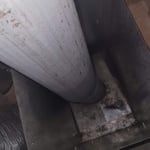 Single wall stove pipe passing through first floor.