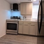 installed a new wall turning a washroom into a full kitchen