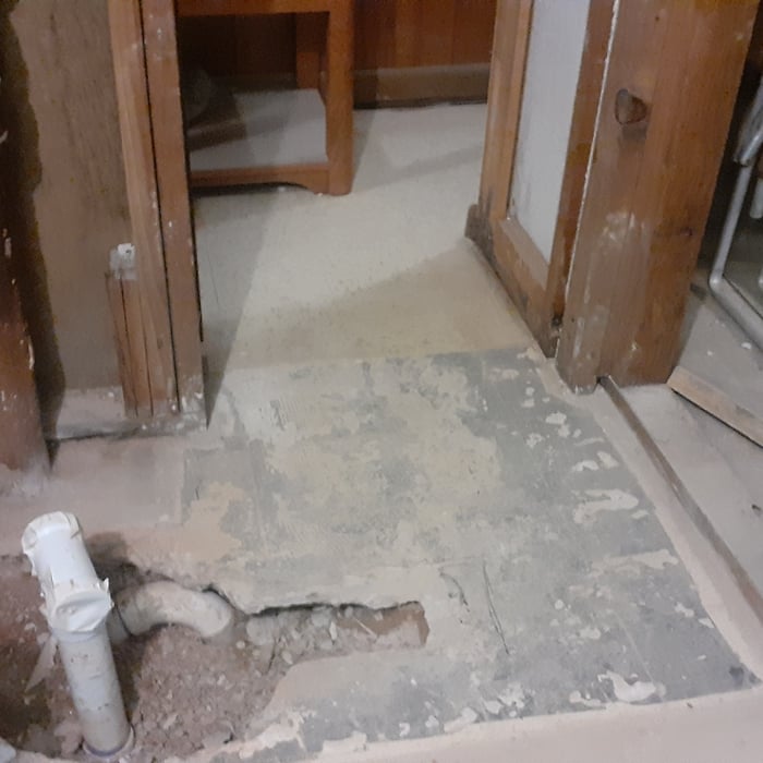 Installing new drain tieing into the main.