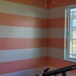 Kid's room. strips around three walls with accent wall