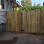 Remove and replace porch and install driveway gate