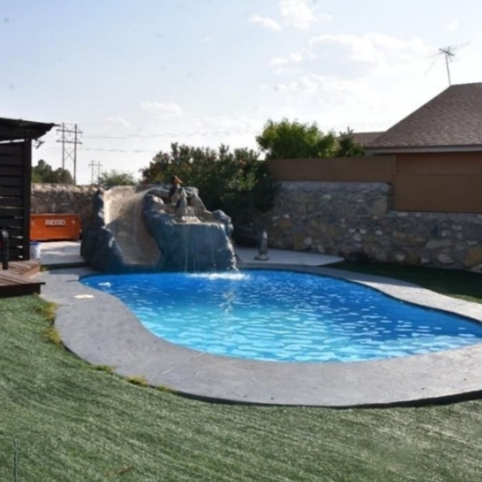 After: Pool repaired, painted and filled