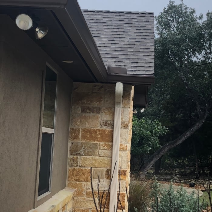 Installation of seamless, gutters and downspouts.