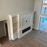 Building shelving, custom entertainment center.