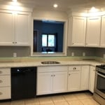 After Picture. Finished antique white cabinets