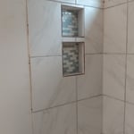 Took tub insert out and imstalled shower insert and tiled and glass shower doors