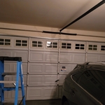 garage door back on track and Rolling Right with car undamaged!