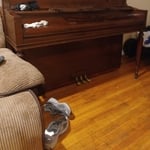 These clients were in moving process so I called them back to send me a picture of the area I measured and where I placed the piano. Sorry about the things laying on top but one I leave I have no access to the picture I’m going to receive.