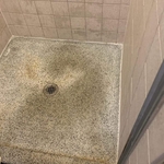 Old shower stall and Terrazzo pan. Hurts the eyes.