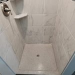Done and finshed new grey marble effect wall tile and the Terrazzo pan restored and resufaced! Just brightened up the view!