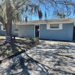 After we washed, scraped, primed and painted the property.