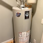 Bradford White 50 gallon water heater with expansion tank and pan.