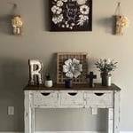 15”x48”x33.5 table. The color scheme is dark walnut top and distressed white with black. Can be customized to your color preferences.