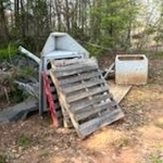 Trash left in yard by previous owners