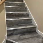 Vinyl plank flooring with nickel bullnose