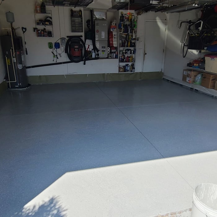 Epoxy coating is applied; color selected wash flat grey with standard flakes.