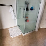 Shower and floor tiling, two bathrooms.