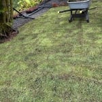 Gravel ,sod,boulders and concrete slab installation