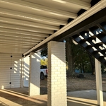 Underdeck Water Management System with Hidden Gutters
