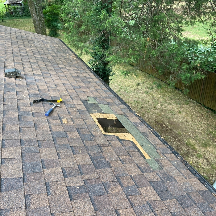 We cut a square into the existing plywood. (Rafter to rafter)