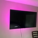 Tv hung on plaster lathe wall